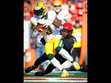 Edmonton Eskimos Natey Adjei runs the ball against the Stampeders in Calgary on Monday, September 2, 2019. Al Charest/Postmedia