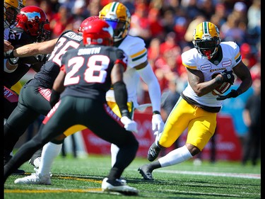 Edmonton Eskimos C. J. Gable runs the ball against the Stampeders in Calgary on Monday, September 2, 2019. Al Charest/Postmedia