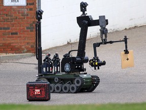 Police use a bomb disposal robot to investigate a suspicious package in Vista Heights on Monday morning, Sept. 9, 2019.