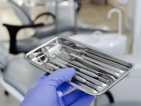 Photo illustration of dental tools.