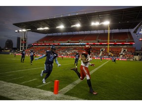 CP-Web.  Calgary Stampeders running back Terry Williams (38) runs in a touchdown in the first half of CFL action against the Toronto Argonauts in Toronto on Friday, Sept. 20, 2019.