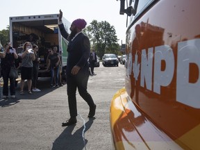 NDP Leader Jagmeet Singh swaves as he arrives at a campaign event in Essex, Ont., Friday, Sept. 20, 2019.
