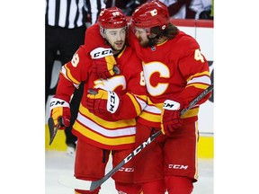 Calgary Flames  Andrew Mangiapane celebrates with teammate Rasmus Andersson after scoring against the Colorado Avalanche in Game One of the Western Conference First Round during the 2019 NHL Stanley Cup Playoffs at the Scotiabank Saddledome in Calgary on Thursday, April 11, 2019. Al Charest/Postmedia