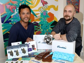 L-R, Evan Mah and Ciprian Georgescu from Friendibles, who send out home kits so people can make their own edibles at home, show what the kits contain at FivePoint Cannabis Bridgeland at 945 Gebneral Ave. N.E. in Calgary on Tuesday, September 10, 2019. Darren Makowichuk/Postmedia