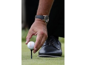 Aug 18, 2019; Medinah, IL, USA; A detailed view of Phil Mickelson putting his ball on the tee on the 9th hole during the final round of the BMW Championship golf tournament at Medinah Country Club - No. 3. Mandatory Credit: Brian Spurlock-USA TODAY Sports ORG XMIT: USATSI-389866