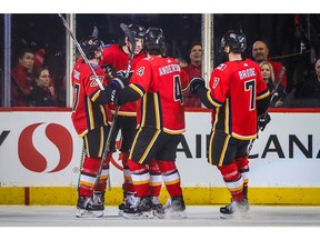 Sep 28, 2019; Calgary, Alberta, CAN; Calgary Flames left wing Milan Lucic (17) celebrates his goal with teammates against the Edmonton Oilers during the second period at Scotiabank Saddledome. Mandatory Credit: Sergei Belski-USA TODAY Sports ORG XMIT: USATSI-406700