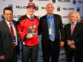 First-round NLL draftee Liam LeClair poses with Roughnecks GM Mike Board (from left), head scout Brian Beisel and assistant coach Bob McMahon on Sept. 17 in Philadelphia.