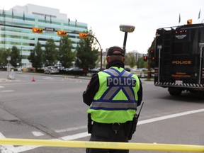The woman was walking in a crosswalk at the intersection of 12th Avenue and 5th Street S.W. when she was hit, police said. She was transported to Foothills Hospital with a broken pelvis.