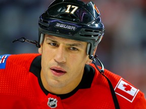 Calgary Flames Milan Lucic during warmup before facing the Winnipeg Jets during pre-season NHL hockey in Calgary on Sept. 24, 2019.