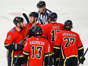 Calgary Flames Sean Monahan celebrates with teammates after his gaol against the Winnipeg Jets during pre-season NHL hockey in Calgary on Tuesday September 24, 2019. Al Charest / Postmedia