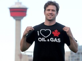 The man behind the "I Heart Canadian Oil & Gas" t-shirts, Cody Battershill, poses for a photo in the cities SW. Sunday, September 22, 2019. Brendan Miller/Postmedia