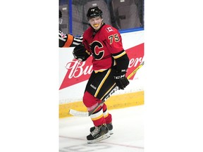 PENTICTON, BC., September 19, 2016 -- Calgary Flames' Eetu Tuulola (75) celebrates his goal against the Vancouver Canucks during second period 2016 NHL Young Stars Classic action at the South Okanagan Events Centre in Penticton, BC., September 19, 2016.   (NICK PROCAYLO/PostMedia)  00045190A   ORG XMIT: 00045190A