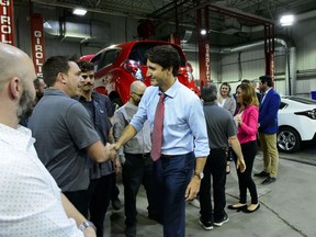 Liberal Leader Justin Trudeau makes a policy announcement and holds a media availability at an electric vehicle car dealership during a campaign stop in Trois-Rivieres, Que., on Friday, Sept. 13, 2019.