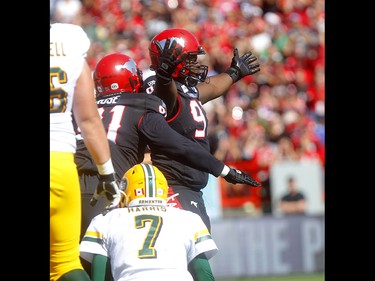 Calgary Stampeders, Derek Wiggan sacks Edminton Eskimos, Trevor Harris in first half action in the Labour Day classic at McMahon stadium in Calgary on Monday, September 2, 2019. Darren Makowichuk/Postmedia