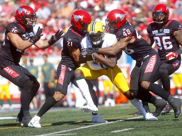 Calgary Stampeders defense stop Edminton Eskimos, DaVaris Daniels in first half action in the Labour Day classic at McMahon stadium in Calgary on Monday, September 2, 2019. Darren Makowichuk/Postmedia