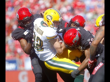 Calgary Stampeders defense stop Edminton Eskimos, Greg Ellingson in first half action in the Labour Day classic at McMahon stadium in Calgary on Monday, September 2, 2019. Darren Makowichuk/Postmedia