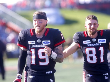 Calgary Stampeders quarterback Bo Levi Mitchell celebreates with teammates after beating the Edmonton Eskimos in the Labour Day classic at McMahon stadium in Calgary on Monday, September 2, 2019. Darren Makowichuk/Postmedia