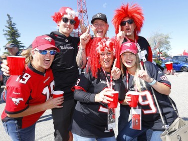 Fans cheer on their team during the tailgate party at McMahon stadium in Calgary on Monday, September 2, 2019. Darren Makowichuk/Postmedia