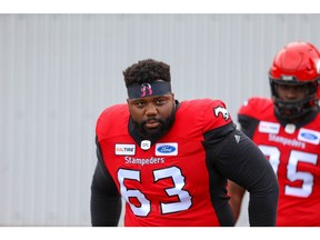 Calgary Stampeders Derek Dennis during warm-up before facing the Hamilton Tiger-Cats in CFL football in Calgary on Saturday, September 14, 2019. Al Charest/Postmedia