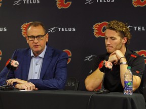 Matthew Tkachuk and Flames GM Brad Treliving address the media at Scotiabank Saddledome on Wednesday, Sept. 25, 2019.