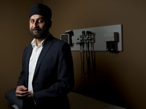 Dr. Anmol Kapoor, seen in his office in Calgary, works on heart disease prevention. Leah Hennel/Postmedia file