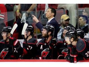 RALEIGH, NORTH CAROLINA - MAY 14: Head coach Rod Brind'Amour of the Carolina Hurricanes looks on against the Boston Bruins during the first period in Game Three of the Eastern Conference Finals during the 2019 NHL Stanley Cup Playoffs at PNC Arena on May 14, 2019 in Raleigh, North Carolina.