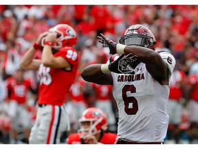 T.J. Brunson #6 of the South Carolina Gamecocks reacts after a missed field goal by Rodrigo Blankenship #98 of the Georgia Bulldogs in second overtime gave them a 20-17 win at Sanford Stadium on October 12, 2019 in Athens, Georgia.
