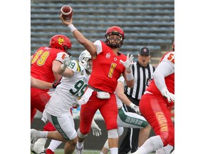 Dino's Quarterback Josiah Joseph makes a pass during the first half of action as the U of C Dino's played host to the U of A Golden Bears at McMahon Stadium on Saturday, October 5, 2019. Brendan Miller/Postmedia