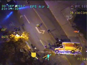 Aerial footage from the Edmonton police helicopter taken after police disabled a speeding U-Haul truck that struck four pedestrians. A police truck knocked the vehicle on its side using a PIT manoeuvre, a jury heard in court.