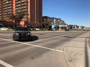 Cops block off a section of Macleod Trail S.W. after a two vehicle shootout on Saturday, Oct. 12.