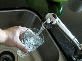 A new expert report on the benefits and harms of fluoridation fuels a debate a city hall on Tuesday.