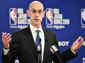 In this file photo taken on October 8, 2019 NBA Commissioner Adam Silver speaks during a press conference in Saitama, Japan. (KAZUHIRO NOGI/AFP via Getty Images)