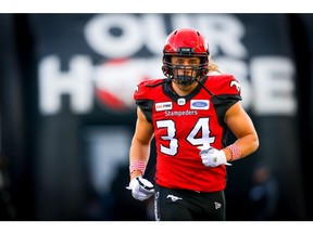 Ante Milanovic-Litre of the Calgary Stampeders runs onto the field during player introductions before facing the Winnipeg Blue Bombers in CFL football on Saturday, October 19, 2019. Al Charest/Postmedia