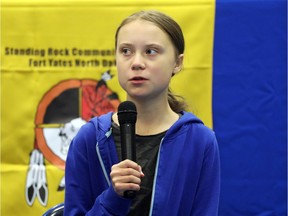 Climate change environmental activist Greta Thunberg joins Red Cloud Indian School student and activist Tokata Iron Eyes at a youth panel at the Standing Rock Indian Reservation, North Dakota, on Oct. 8, 2019.