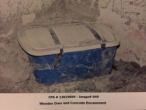 The container investigators allege was used to contain the body of Lisa Mitchell is seen in this undated police handout image which was entered into evidence in the trial of Allan Shyback, who was convicted of manslaughter and indignity to a body in the 2012 death of Mitchell. A man who strangled his wife and concealed her body in a wall of their home is going back to prison after having his parole revoked at a hearing in central Alberta today.