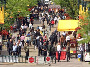 Downtown workers packed onto Stephen Avenue Mall on June 19, 2012 over the lunch hour.