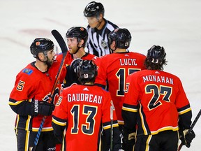 Calgary Flames Sean Monahan celebrates after his goal against the Winnipeg Jets during pre-season NHL hockey in Calgary on Sept. 24, 2019.