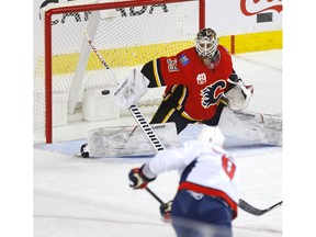 Calgary Flames goalie Cam Talbot is scored on by Washington Capitals superstar Alex Ovechkin in second period NHL action at the Scotiabank Saddledome in Calgary on Tuesday, October 22, 2019. Darren Makowichuk/Postmedia
