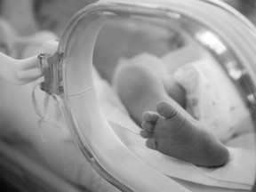 Newborn baby in an incubator. (Getty Images illustration)