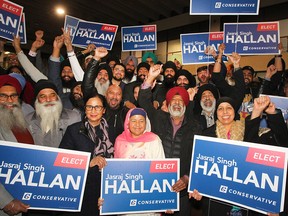 Jasraj Singh Hallan, Conservative Candidate for Calgary Forest Lawn  is cheered by supporters after winning his riding on Monday, Oct. 21, 2019.