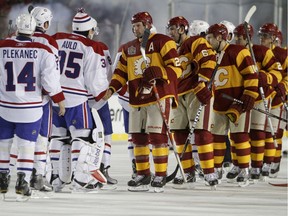 The Calgary Flames and Montreal Canadiens shake hands at McMahon Stadium in Calgary on Sunday February 20, 2011. The Flames beat  the Habs 4-0 in the marquee event of the Heritage Classic outdoor-hockey weekend. LYLE ASPINALL/CALGARY SUN/QMI AGENCY