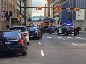 Calgary police block off an intersection in the downtown core after an officer-involved shooting on October 19, 2019. Brendan Miller/Postmedia Calgary