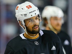 Oliver Kylington and the Calgary Flames prepare for Thursday's season opener against the Colorado Avalanche.