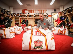 Flames equipment manager Mark DePasquale and his team get ready to head to Mosaic Stadium in Regina for Saturday's Heritage Classic.