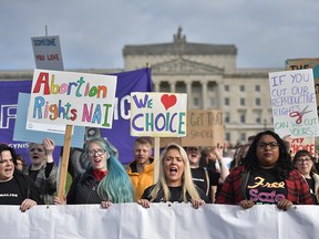 Abortion-rights demonstrators march through the streets of Belfast ahead of a meeting of the Stormont Assembly on October 21, 2019 in Belfast. (Charles McQuillan/Getty Images)
