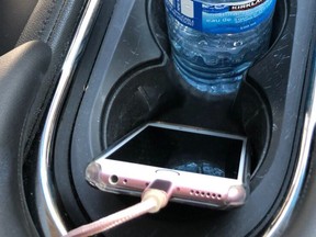 A B.C. woman was fined $368 for having a cell phone in her cup holder.