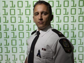 Then Edmonton Police Service Insp. Chad Tawfik poses for a photo a EPS headquarters, in Edmonton Alta., on Wednesday Feb. 4, 2015. Tawfik has recently been hired to serve as a deputy chief for the Calgary police.