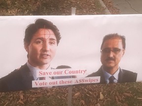 An election lawn sign in Mill Woods depicting Liberal leader Justin Trudeau and Edmonton Mill Woods Liberal candidate Amarjeet Sohi with crosshairs on their foreheads is being looked into by Edmonton police. Image supplied twitter.com