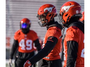 The Calgary Stampeders' DaShaun Amos takes in practice at McMahon Stadium on Wednesday. Photo by Azin Ghaffari/Postmedia.