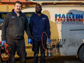 Pest Control Specialists William Martin, left, and Abe Mawoyo, from MartinÕs Perst Control pose for a photo outside the Canadian Tire in Airdrie on Wednesday, November 13, 2019. Azin Ghaffari/Postmedia Calgary